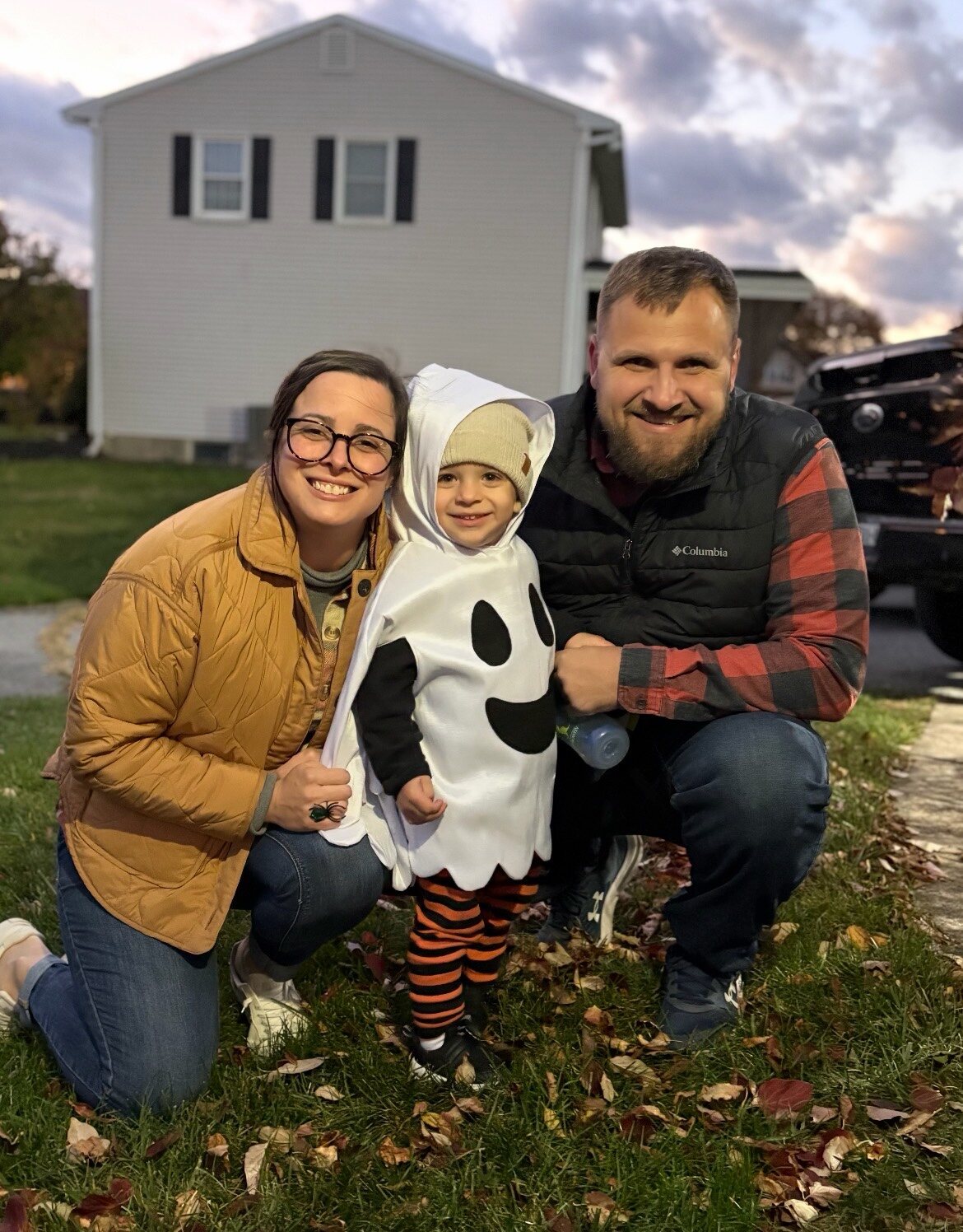 Josh Grubb with his wife and family outdoors